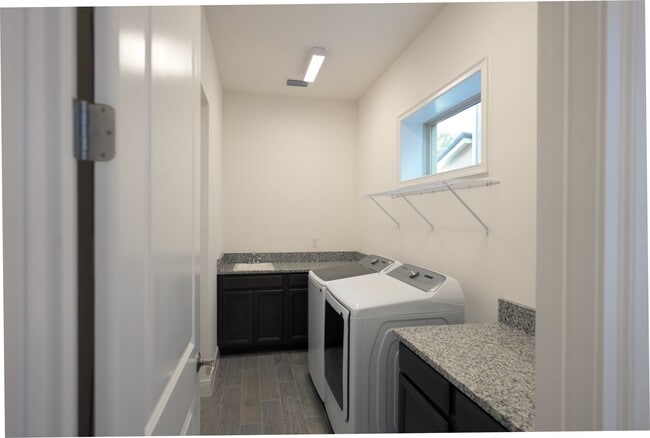 laundry with 8' barn door - 13222 Bromborough Dr