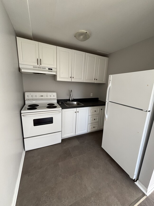 Building Photo - Cozy Unit Ready to Occupy