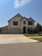 Building Photo - 7413 Sprangletop St