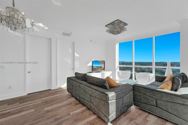 Building Photo - 18201 Collins Ave