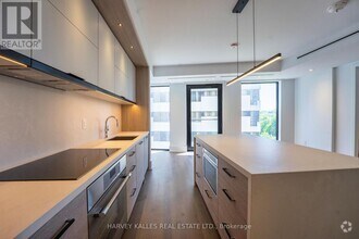 Building Photo - 215-1215 Lonsdale Rd