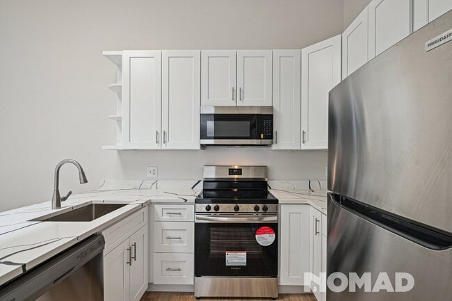 Building Photo - Charming 1BR Condo in Denver