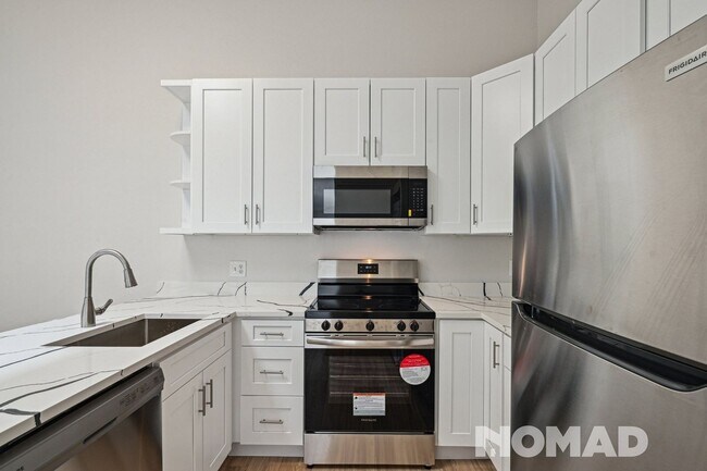 Foto del edificio - Charming 1BR Condo in Denver