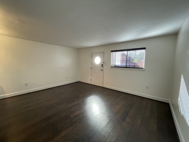 FRESHLY PAINTED FAMILY ROOM WITH LUXRY VINYL TILE - 389 Ralph McGill Blvd NE