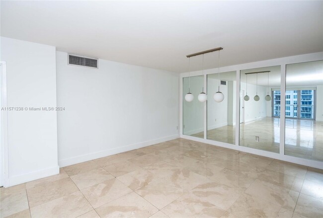 Building Photo - 5701 Collins Ave
