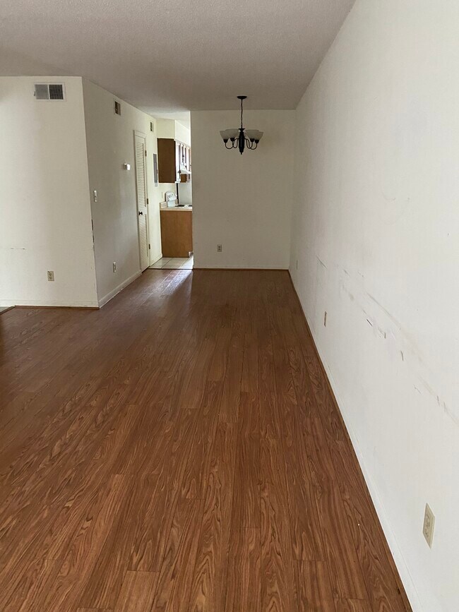 Living area. The walls have since been completely repainted. - 1412 11th St S