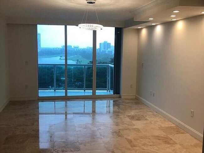 Building Photo - 20201 E Country Club Dr