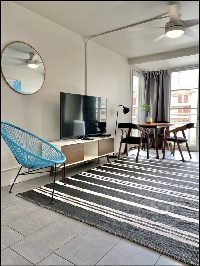 Dining Table and 60" TV in Livingroom - 445 Kaiolu St