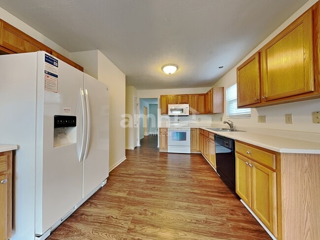 Building Photo - 6312 Satin Wood Dr