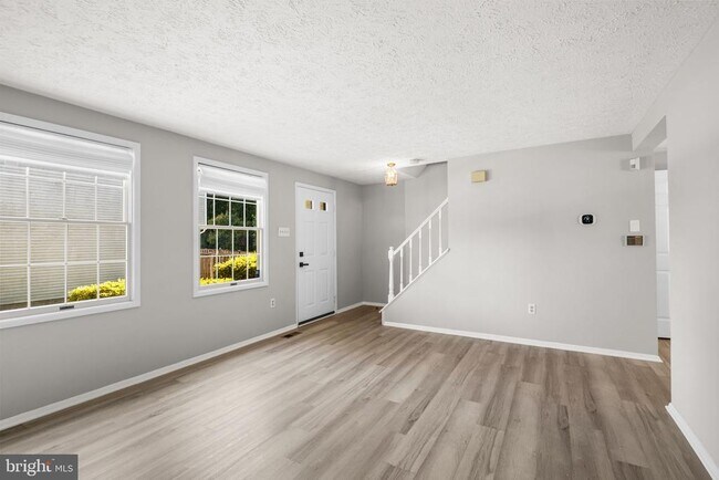 Building Photo - 7807 Breezy Down Terrace