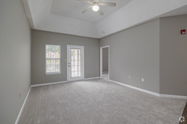 3BR, 2BA - 1,350SF - Living Room - Magnolia Lake Apartments