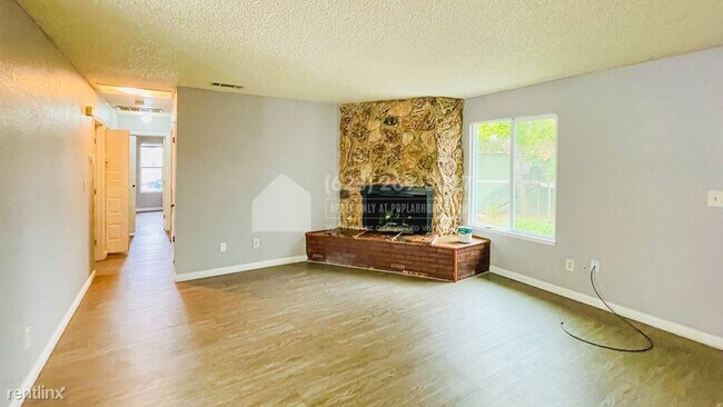 Building Photo - 2 br, 2 bath Triplex - 8954 Rancho Grande ...