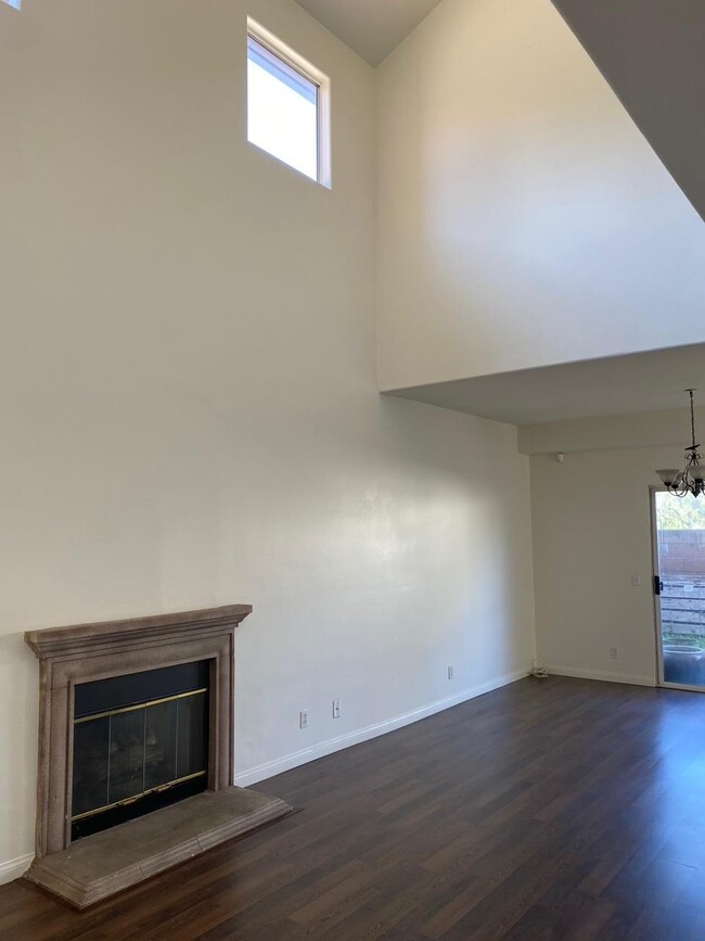 Fireplace in Living Room Area - 9400 Burnet Ave