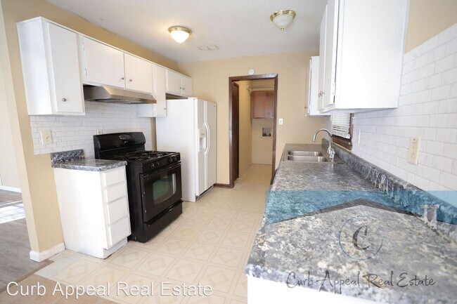 Building Photo - 3 br, 1.5 bath House - 1425 Overhill