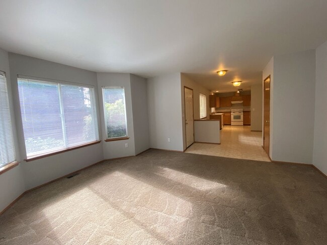 Building Photo - Single Story Duplex with Peekaboo Lake Views!