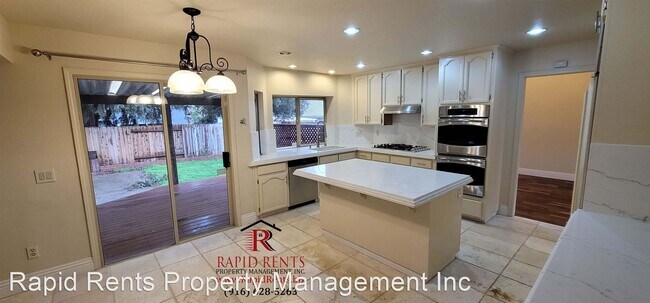 Building Photo - 4 br, 3 bath House - 9033 North Camden Drive