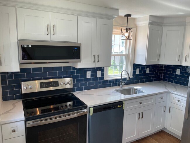 Building Photo - The Blue Backsplash Cape