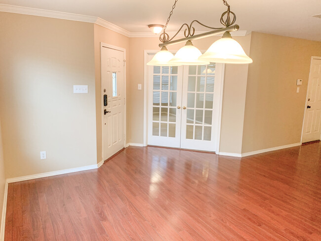 French doors leading into den/bonus room - 25711 Roman Shade
