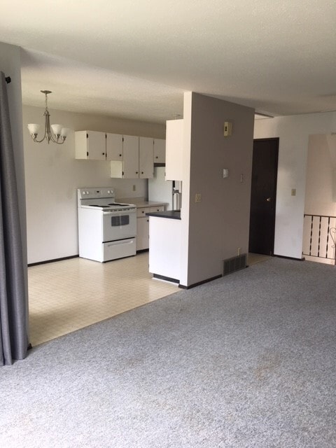 Building Photo - 3 Bed 1.5 Bath Unit in Olds, AB