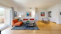 Located at 909 W Temple St in Los Angeles, this thoughtfully designed 3-bedroom, 1-bathroom residence offers a comfortable and stylish single-floor layout. The open-concept living and dining area is bright and welcoming, featuring warm hardwood flooring, crown molding, and large sliding glass doors that lead to a private balcony overlooking lush greenery — filling the space with natural light and outdoor views. The living area comfortably accommodates both a seating and dining arrangement, making it ideal for everyday living and entertaining.

The kitchen is well-equipped with rich wood cabinetry, dark granite countertops, stainless steel appliances including a gas range and refrigerator, and tile flooring. A peninsula with bar seating connects the kitchen to the living area, adding both function and flow.

The primary bedroom offers a comfortable retreat with hardwood flooring and ample closet space. The two additional bedrooms each feature hardwood floors and windows with natural light. The bathroom is finished with tile flooring, wood vanity cabinetry, dark countertops, dual sinks, and a full shower-tub combination. A dedicated laundry area and two closets add practical storage throughout the home.