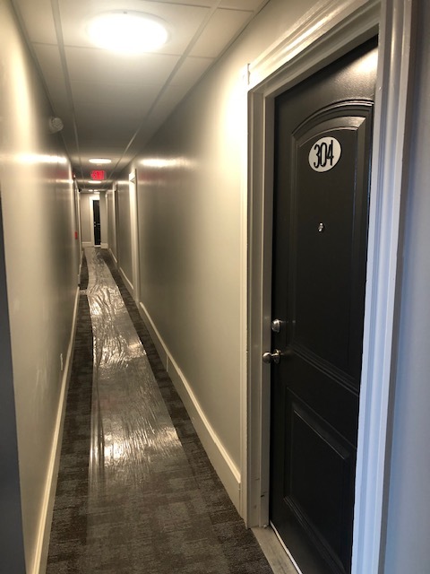 Newly updated hallway - Fitch Block Apartments