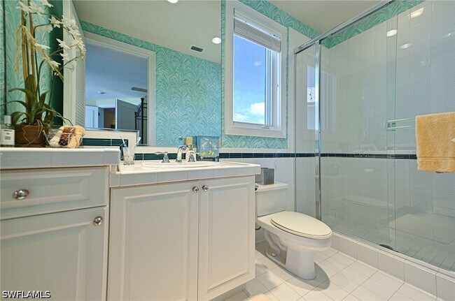 Foto del edificio - 235 Barefoot Beach Blvd
