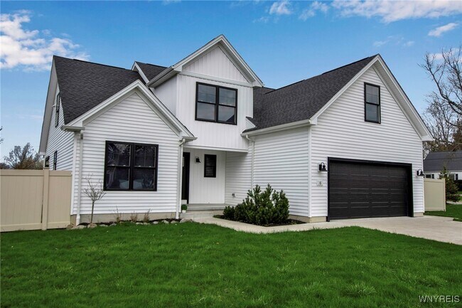 Foto del edificio - 6 Rolling Woods Ln