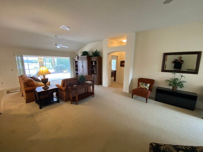 Building Photo - SEASONAL RENTAL. Large 4 Bed + 4 1/2 Baths Home, w/Views of the Jacaranda Golf Course and Lake in...