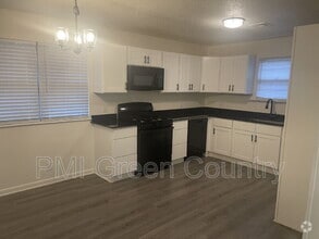 Building Photo - 428 S 67th E Ave