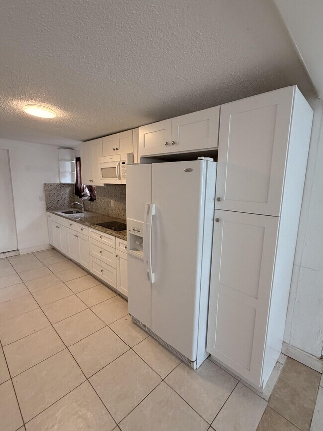 Foto del edificio - "Charming 1-Bedroom Retreat in Tampa - Cozy 650 Sq. Ft. Home Awaits!"