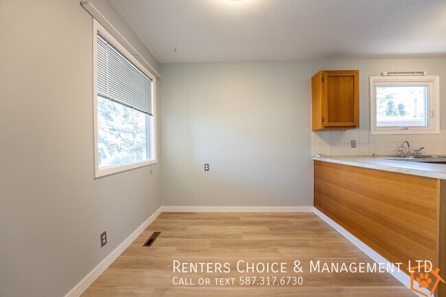 Building Photo - Half Duplex with Must-See Garage & Large Yard!