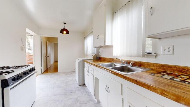 Building Photo - 1226 W 144th St