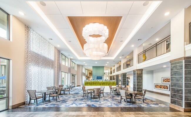 La escena - Salón social - Overture Crabtree 55+ Active Adult Apartment Homes