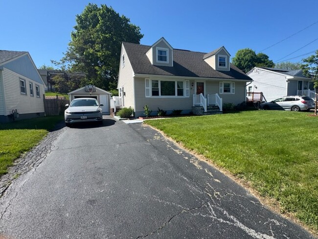 Building Photo - Sunny, Modern Mid-Century Cape 4 BR Spacio...