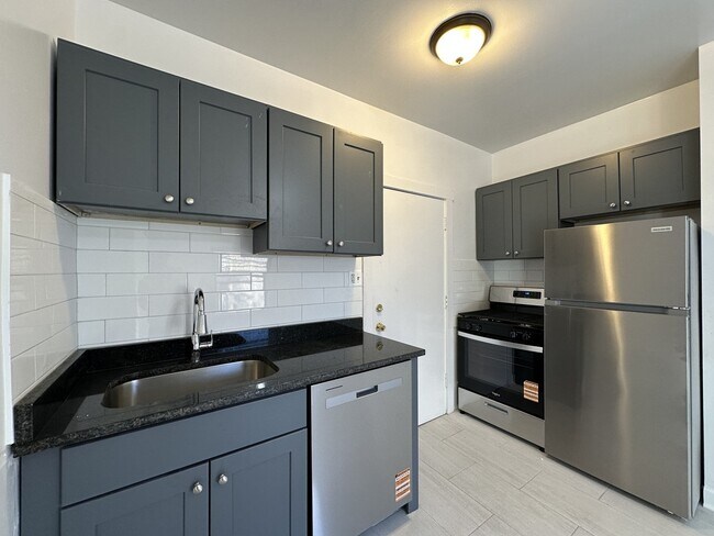 Building Photo - 1319.5 W Estes Ave