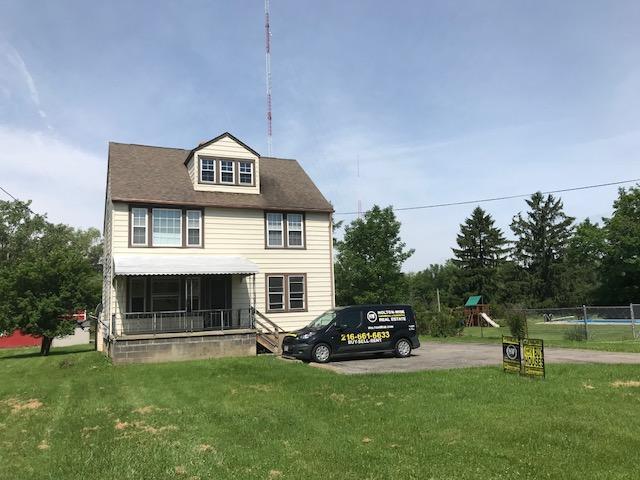 Building Photo - 9584 Ridge Road #01