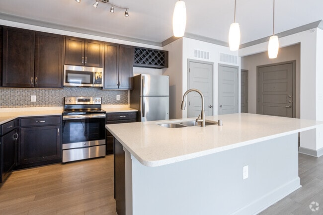 11BR, 1BA - 829 SF-897 SF - Beargrass/ Rodgers- Kitchen - Axis on Lexington Apartments