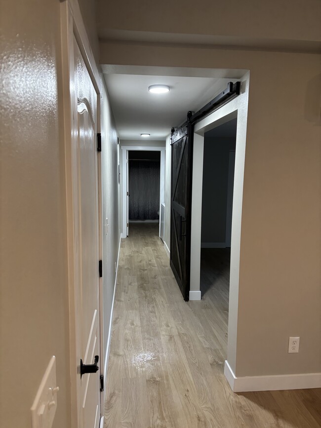 Barn door access to bedroom - 1504 W 7th Pl