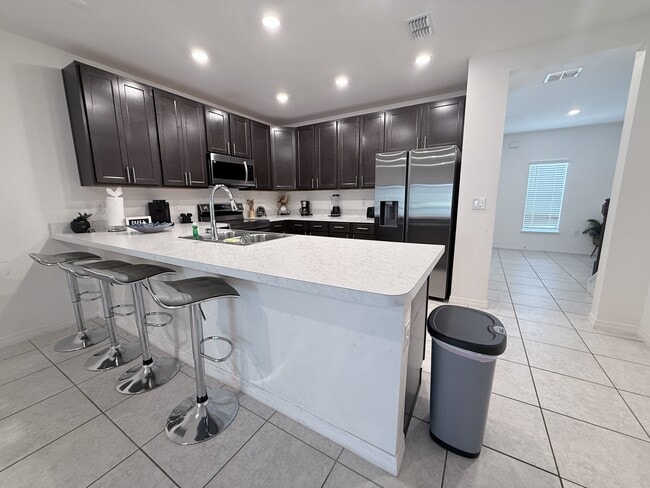 Photo - 4875 Coral Castle Dr. (Kissimmee, FL) Townhome
