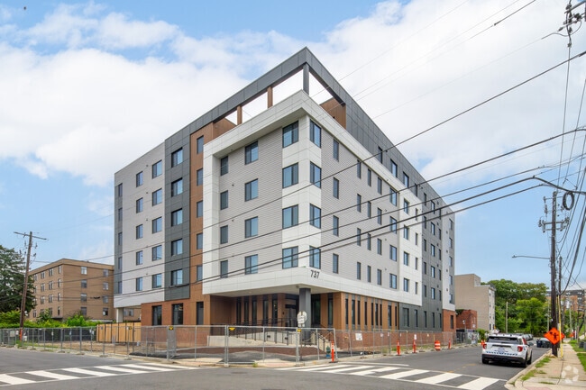 Building Photo - H.R. Crawford Gardens 55+ Senior Apartments