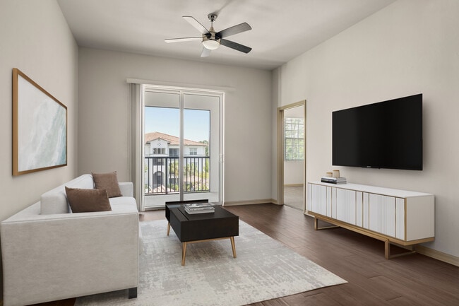 Spacious living rooms designed for comfort and style. - Aster at Lely Resort