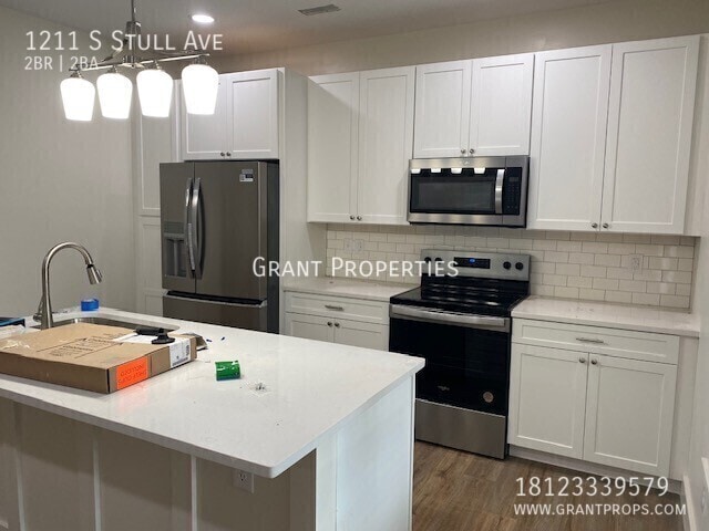 Building Photo - 1211 S Stull Ave