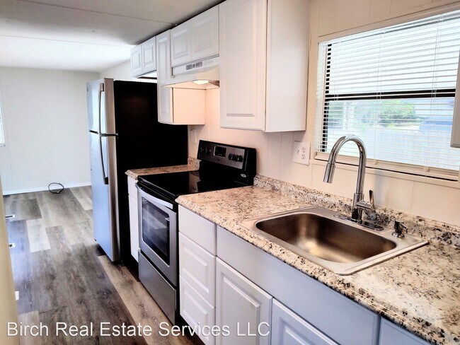 Foto del edificio - 1 br, 1 bath House - 7040 Commons Boulevard