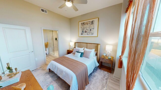 Drift into Tranquility: Relax in our Expansive Bedrooms - Triton Cay - Daytona Apartments