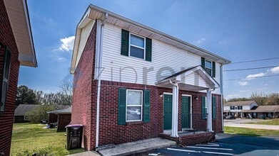 Building Photo - Unit APT E