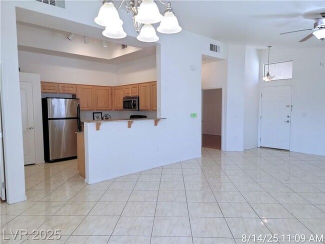 Building Photo - GORGEOUS SW 2nd FLOOR UNIT IN GATED COMMUN...