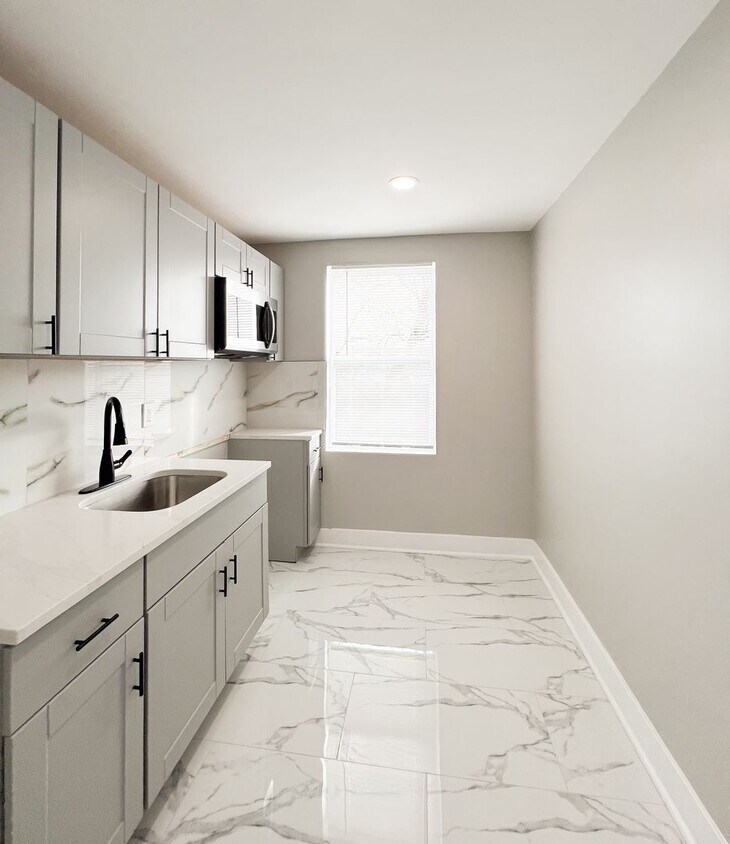 Foto principal - 5548 Woodland Ave