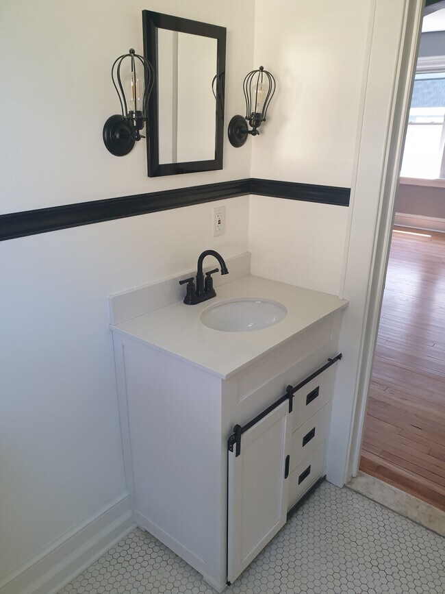 Bathroom 1 farm door vanity - 115 7th Ave
