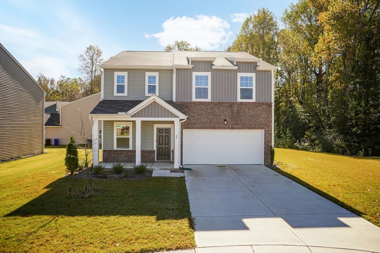 Foto principal - Spacious 4-Bedroom Home with Open Layout