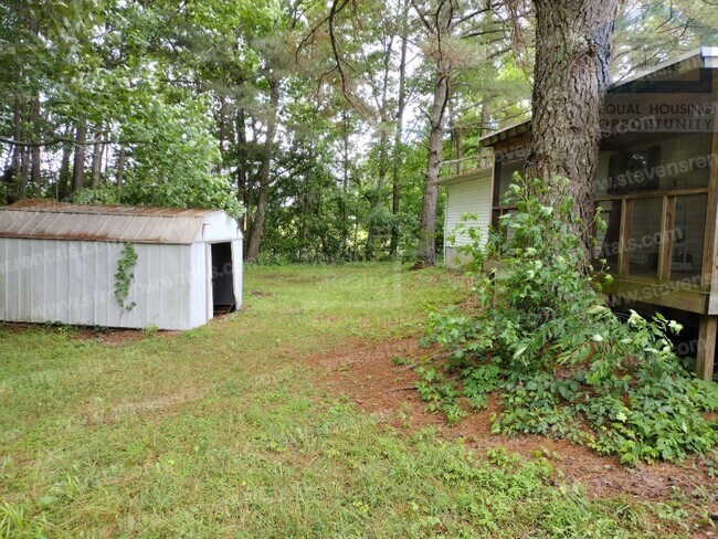 Building Photo - One Place, Many Things